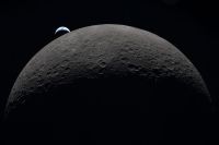 Earth Set Image from Artemis II showing the moon in foreground and waning crescent earth above and to the left of the moon